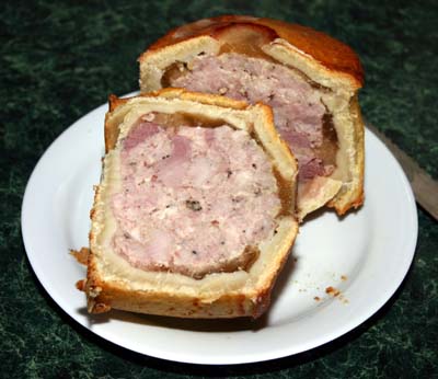 The first tin-baked pie after cutting